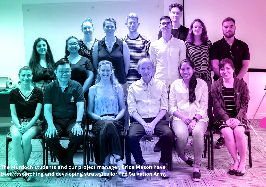 Team of MESH students sitting for a photo together.